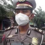 Polisi Rekayasa Lalu Lintas Jalan Raya di Jombang Yang Terendam Banjir