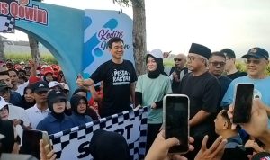 Meriah, Ribuan Warga Kediri Ikuti Jalan Sehat Pesta Rakyat Vinanda-Gus Qowim